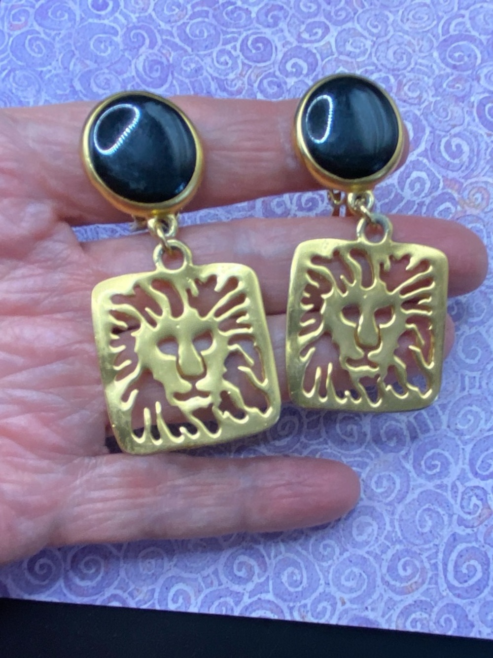 Gold Lion Motif Drop Clip On Earrings With Black Cabachon